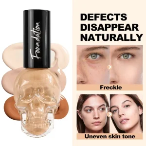 Beige cosmetic foundation bottle featuring a black cap and clear skull packaging Natural shade liquid face makeup with a distinctive skull-shaped package design