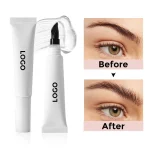 Spiral brow brush applicator attached to a professional eyebrow gel tube