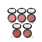 Soft blush applied to the cheeks with a makeup brush
