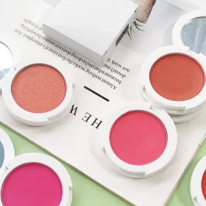 Close-up view of finely milled pink cheek powder
