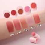 Blush stick being applied directly to the cheek