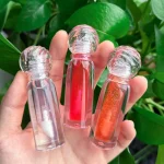 Tinted lip oil adding subtle color and natural shine