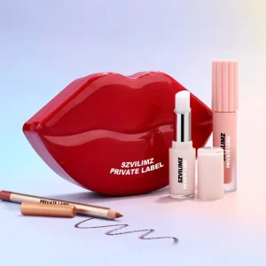 Glossy lip color included in a three piece makeup collection