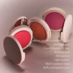Cream blush adding a fresh pop of color to the cheeks