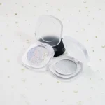 Smooth creamy highlighter surface with luminous pigment