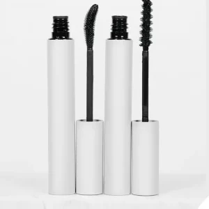 Cosmetic tube photographed with the mascara brush exposed