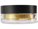 Buildable loose powder for brighter looking features