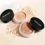 Loose powder makeup product shown with its cosmetic container