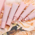 Flexible lip gloss tube standing upright for product display