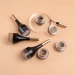 Pigmented pomade for creating structured and symmetrical brows