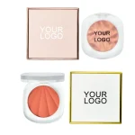 Face highlighting powder and cheek color shown in one makeup display