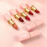 Close-up of a solid lipstick with a creamy color core