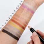 Cream highlighter and contour makeup in a compact stick format